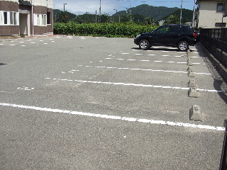Parking lot. It was to ensure plenty of parking spaces on site.