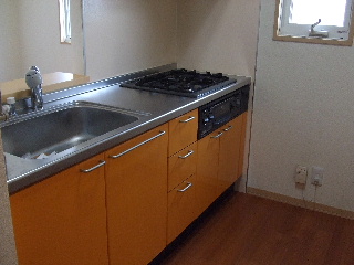 Kitchen. 3-neck is a stove equipped with kitchen.