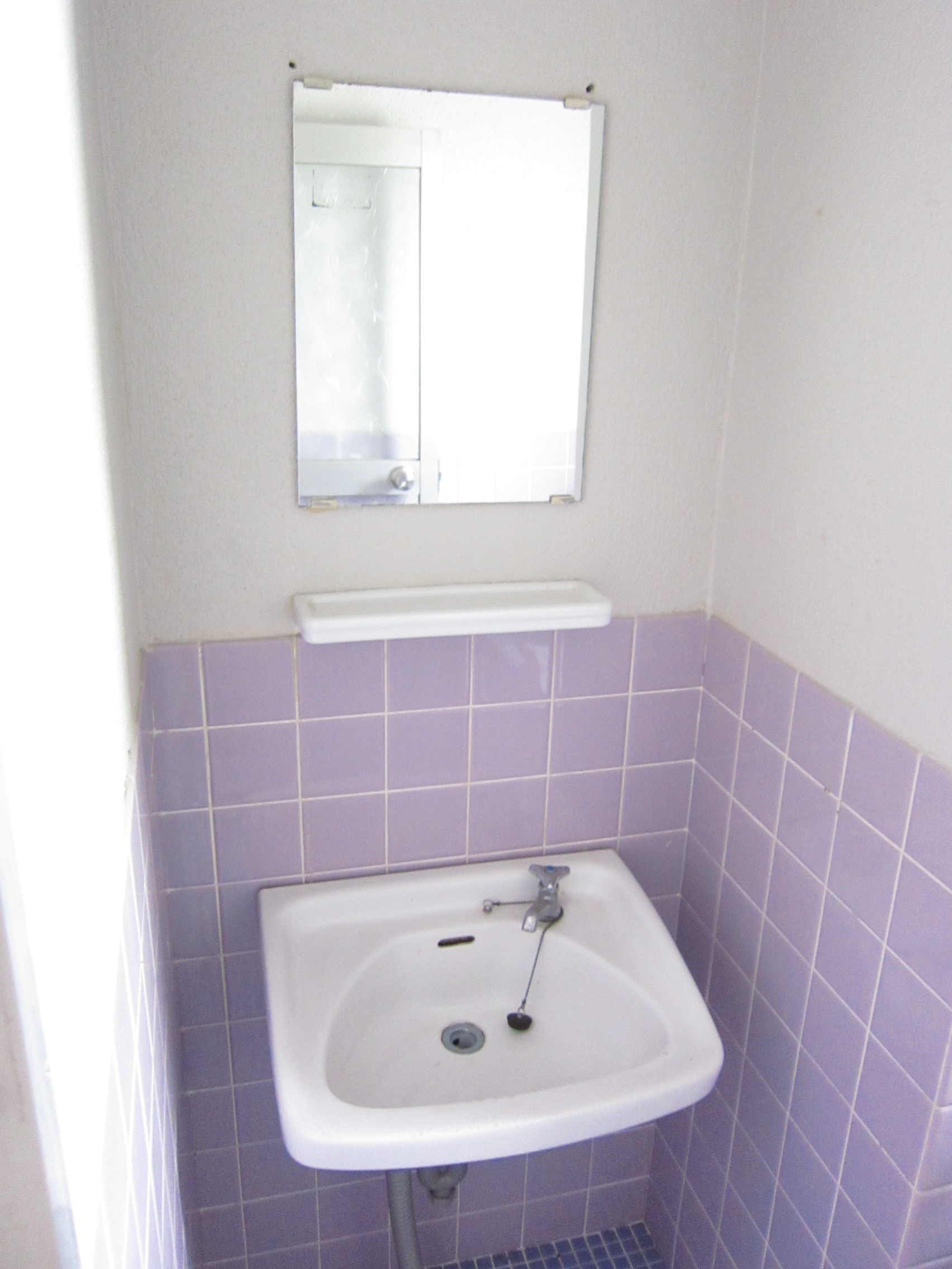 Washroom. Wash basin is located in the bathroom!