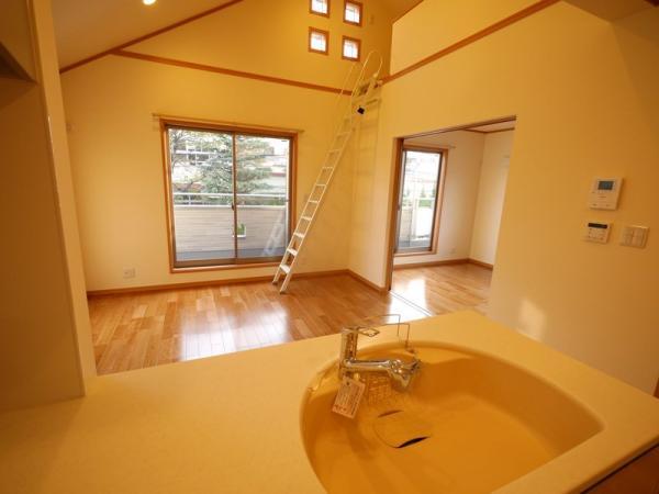 Living. A Building Living room seen from the kitchen
