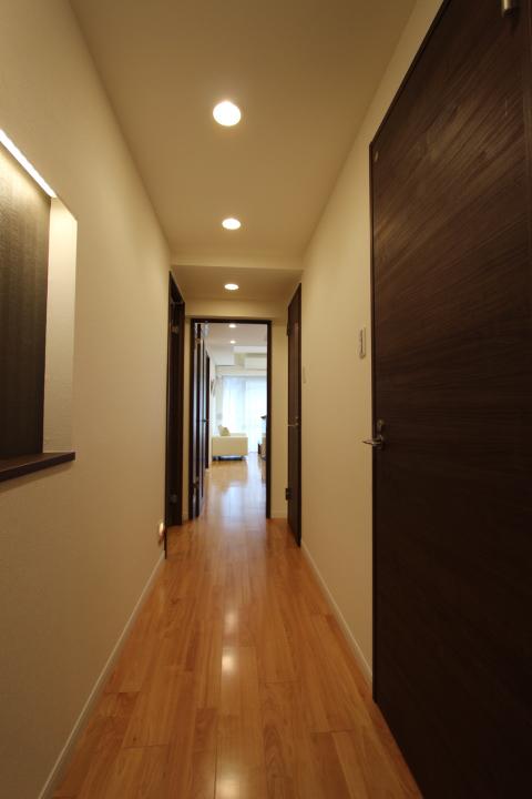 Entrance. Downlight new installation. Corridor of calm impression.