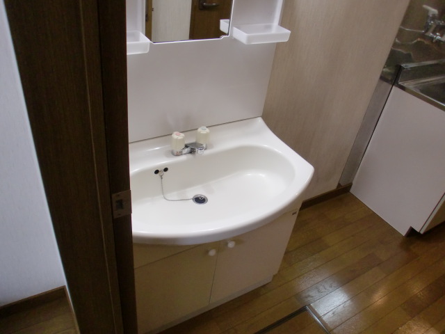 Washroom. Also it comes with a separate wash basin.