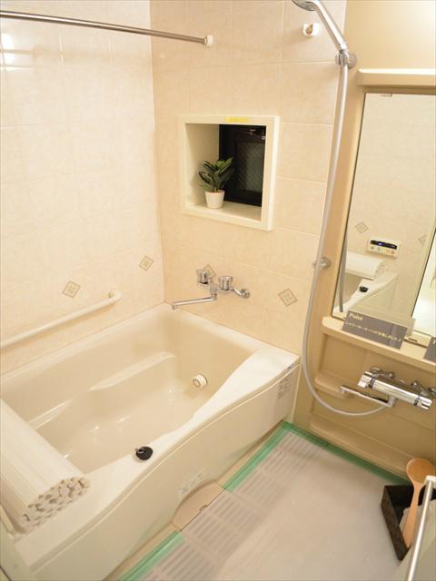 Bathroom. Bathroom with a large mirror and a small window