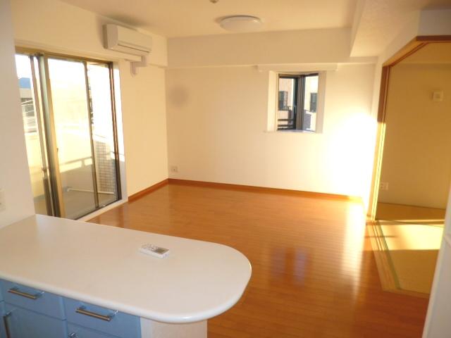 Living. Corner dwelling unit of living is bright and airy good