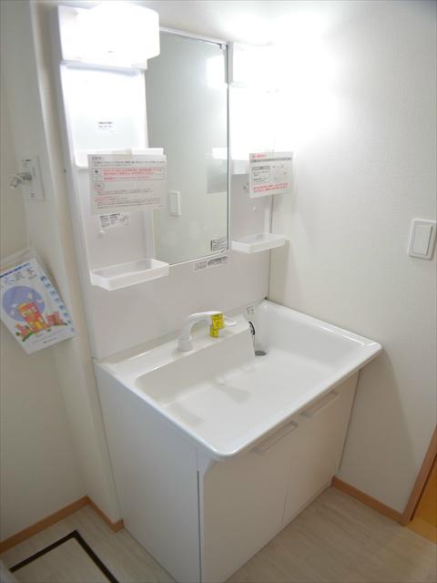 Wash basin, toilet. Wash basin with a shower