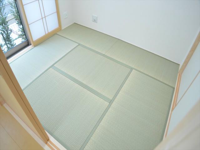 Non-living room. There is Japanese-style room is next to the living room