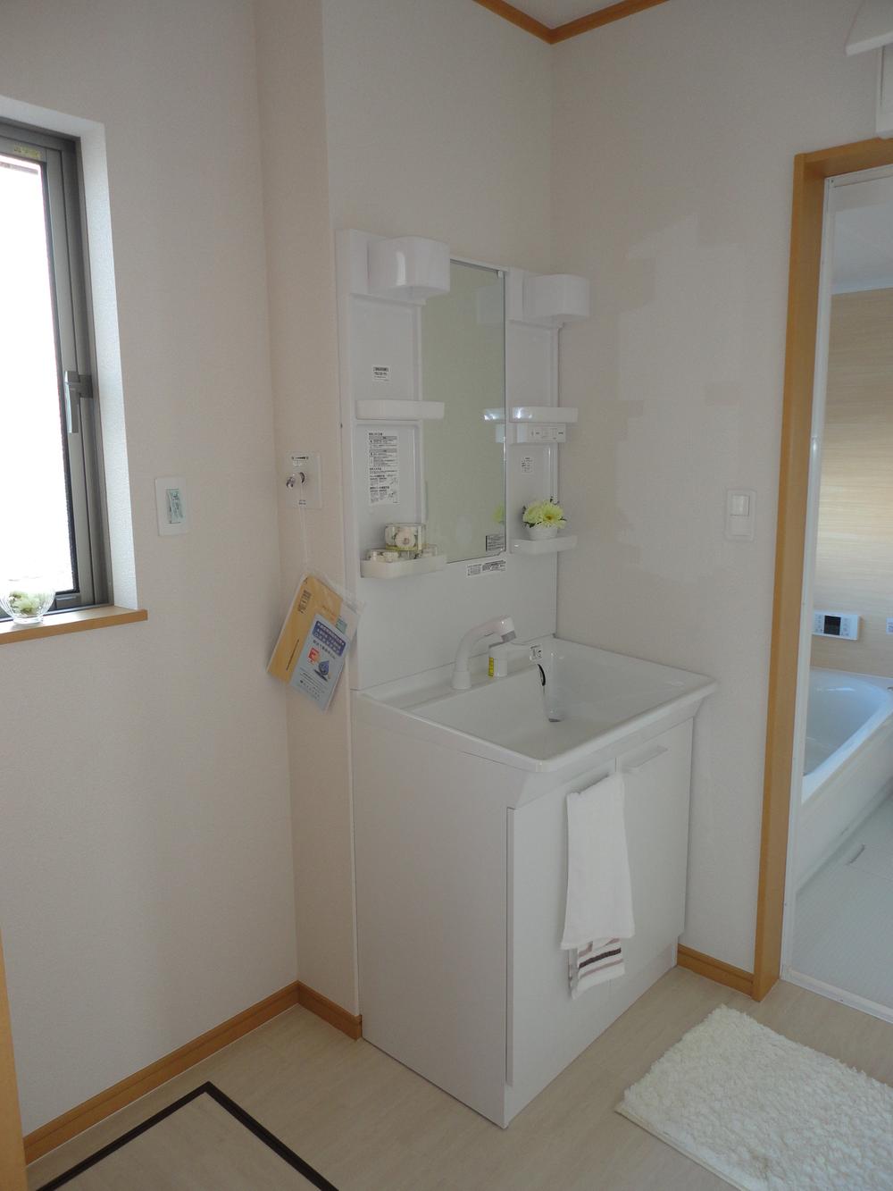 Wash basin, toilet. A Building