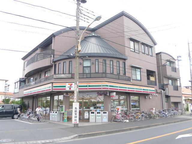 Convenience store. Seven-Eleven Adachi Shimane store up (convenience store) 459m