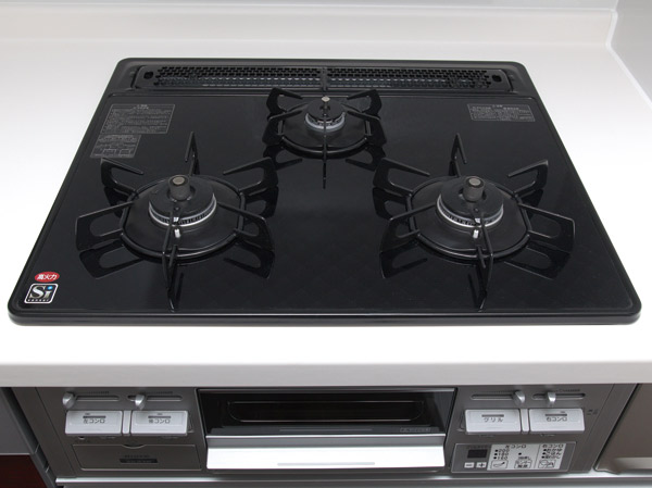 Kitchen.  [Glass top stove] With temperature control function.