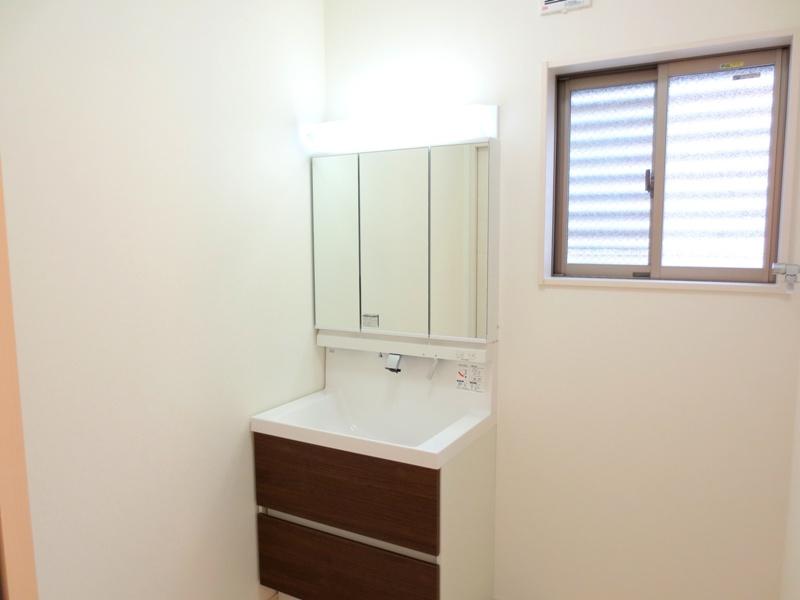 Wash basin, toilet. A Building Bathroom vanity