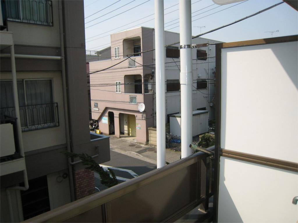 Balcony. But view is there is a sense of being surrounded by neighboring building, Sunshine is secured or