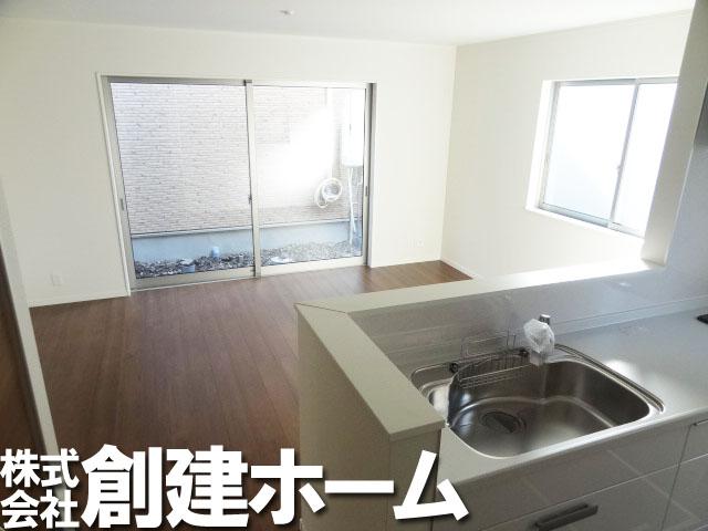 Living. Living room overlooks the kitchen.