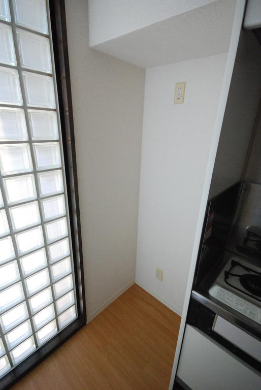 Kitchen. Horizontal space of kitchen. Refrigerator is placed in here!