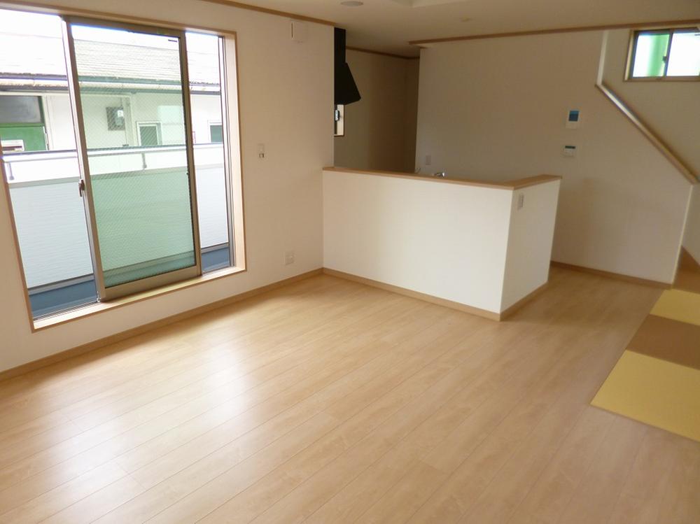 Living. Bright living room sunshine enters in the south-facing balcony!