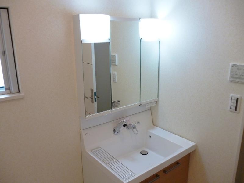 Wash basin, toilet. A Building Bathroom vanity