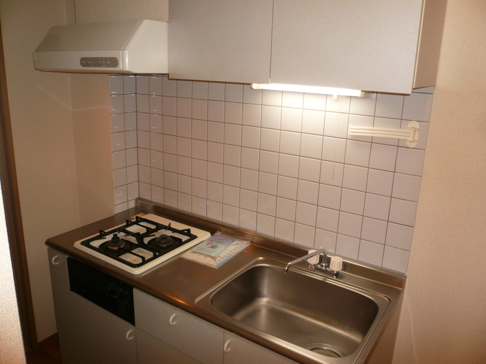 Kitchen. 2-neck with gas stove, In storage lot with hanging cupboard