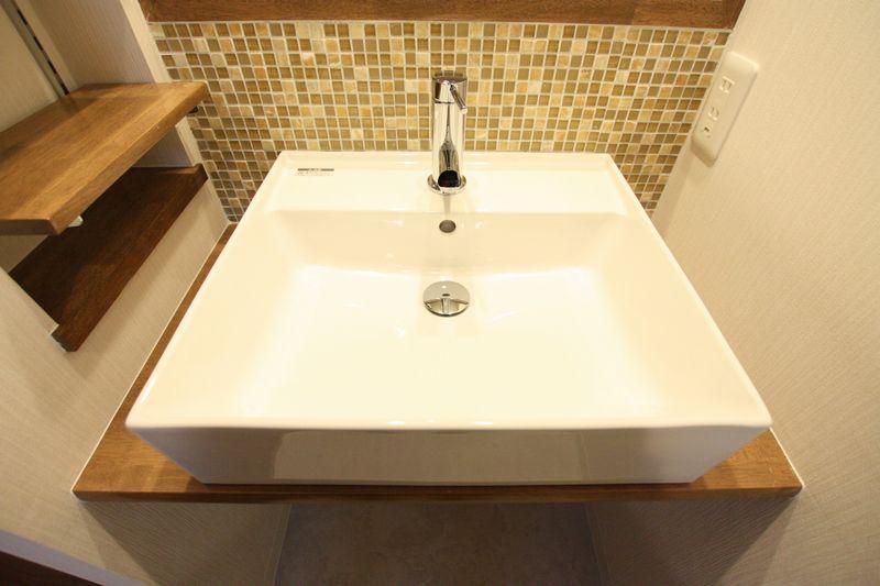 Wash basin, toilet. Stylish design of the tiled