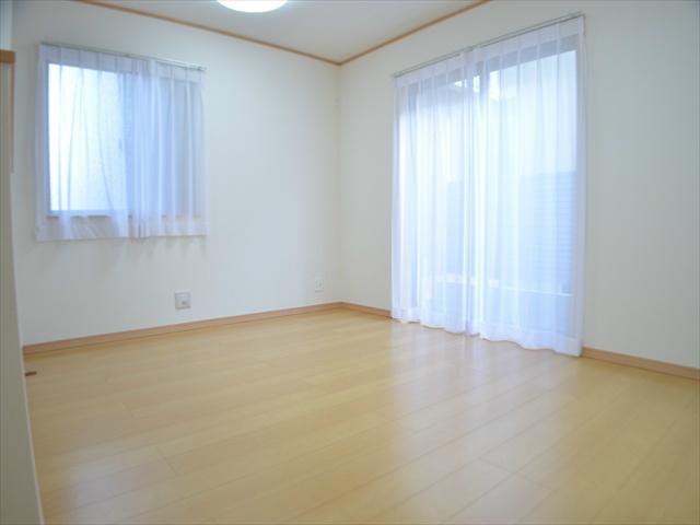 Living. Living entering from two directions of light