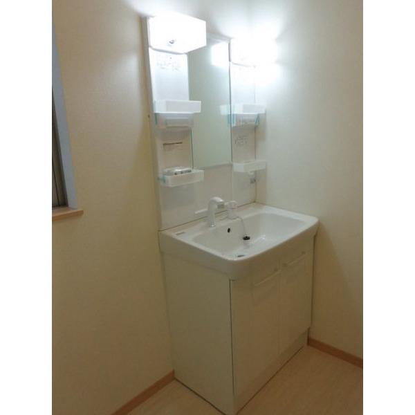 Wash basin, toilet. Washroom