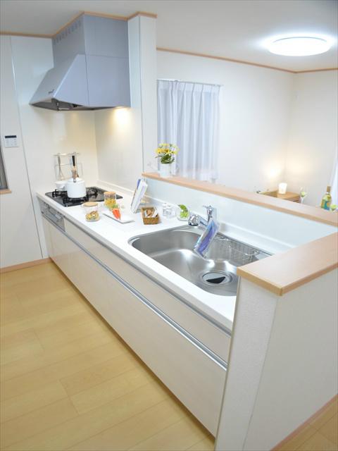 Kitchen. Dishes while watching the situation of children who are living