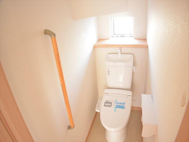 Toilet. Bright toilet there is a small window