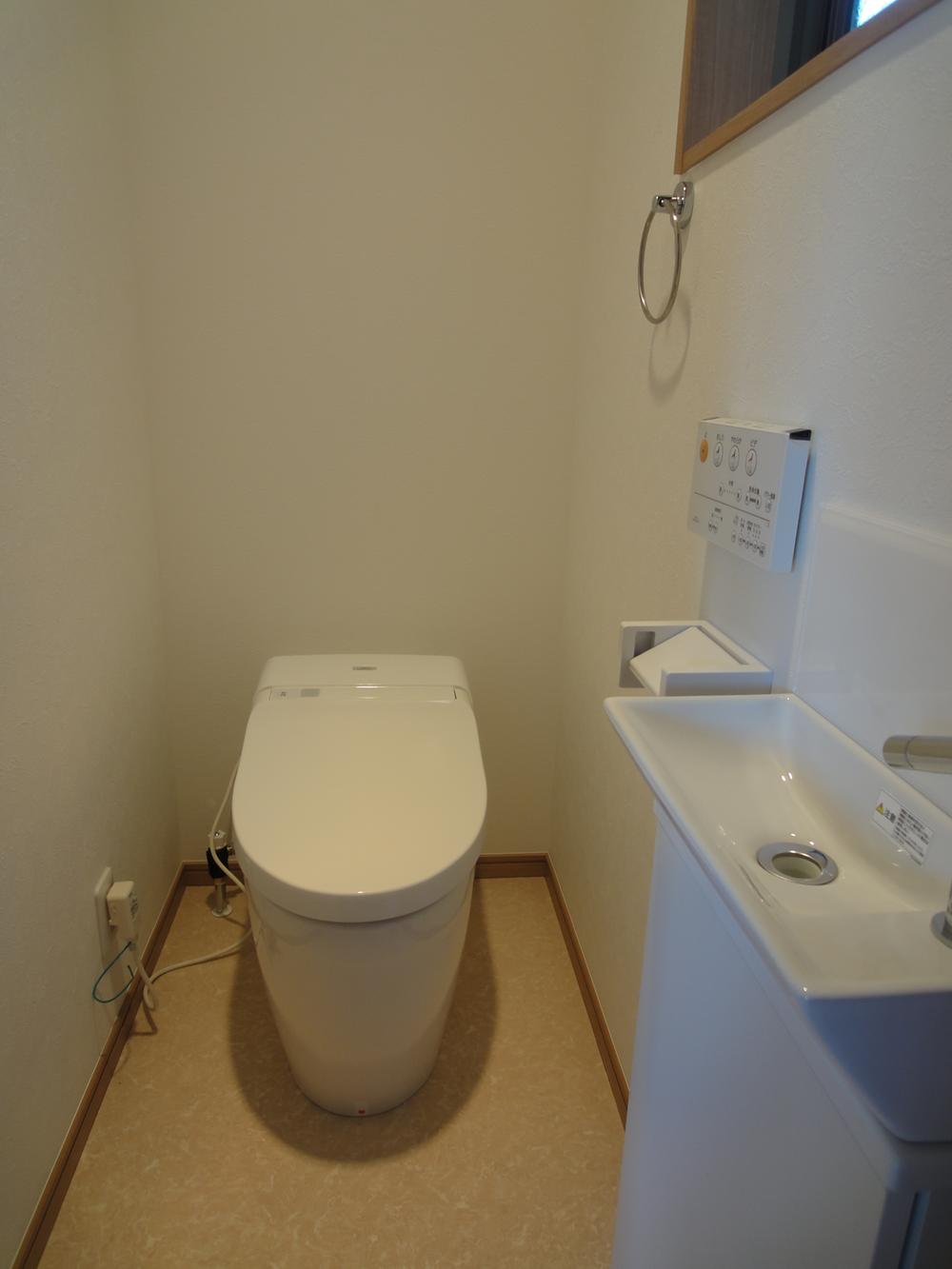 Toilet. Stylish toilet tank-less