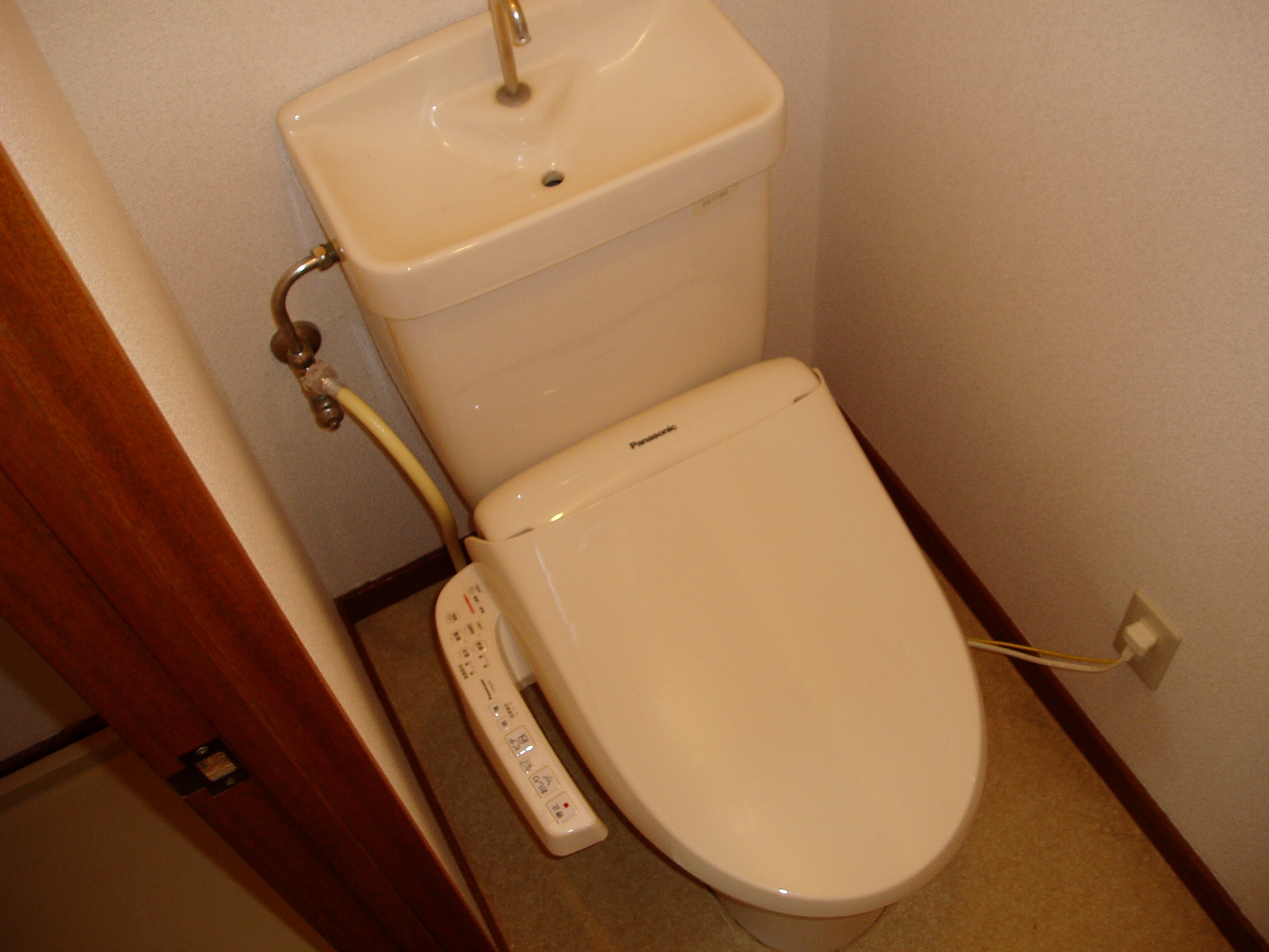 Toilet. New bidet attachment