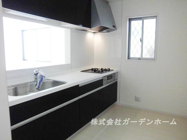 Model house photo.  ■ Popular face-to-face system kitchen to wife ■ 