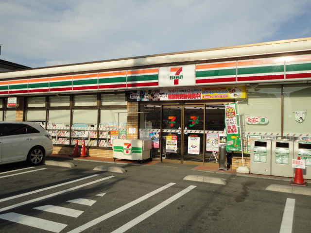 Convenience store. Seven-Eleven Adachi Shikahama store up (convenience store) 411m