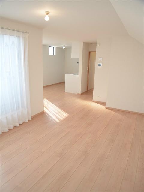 Living. To capture the light from the large windows