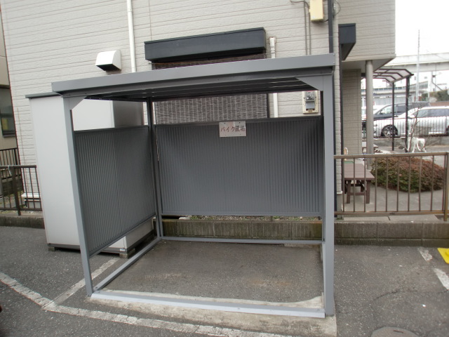 Parking lot. Covered bike shelter