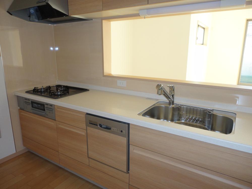 Kitchen. Fashionable luxury floating interior of kitchen.  You friendly atmosphere of woodgrain is the director makes a nice kitchen life.  With happy dishwasher to housework. 