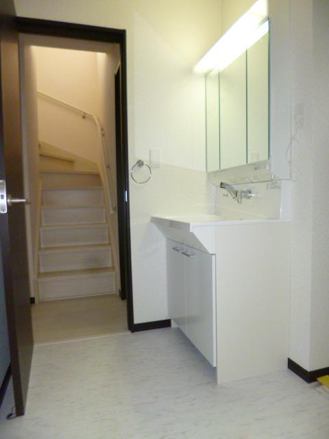 Wash basin, toilet. Bathroom vanity