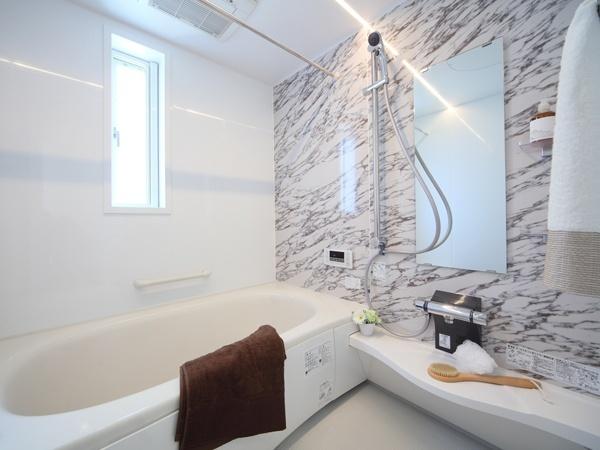 Bathroom.  [bathroom]  With gas-type bathroom heater dryer warm tub. Is a design that uses a flat line LED lighting and metal shower faucet. 