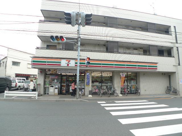 Convenience store. Seven-Eleven Adachi Aoi 2-chome up (convenience store) 574m