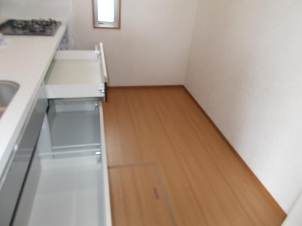 Kitchen. Also clean around the easy-to-use slide-out kitchen storage Kitchen