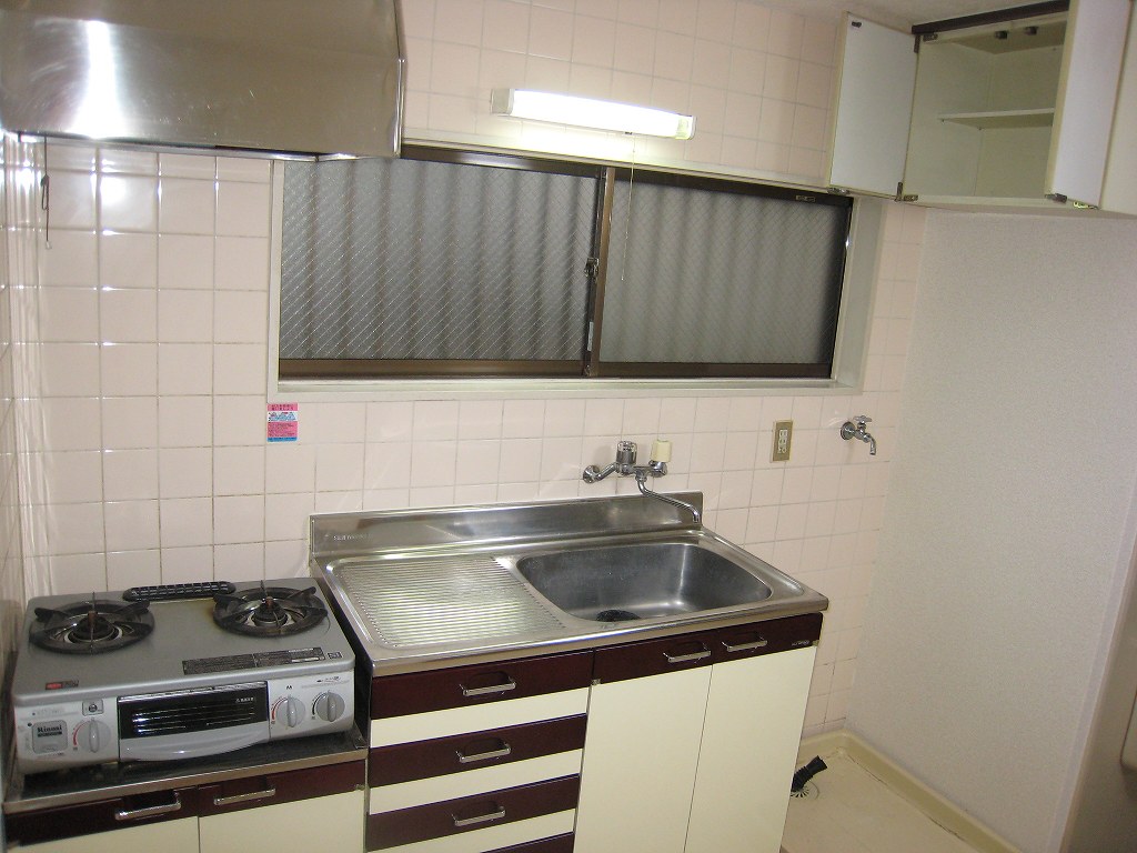 Kitchen. The window is large, bright kitchen