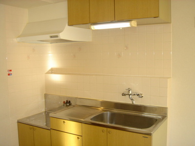 Kitchen. Storage-rich kitchen with hanging cupboard!