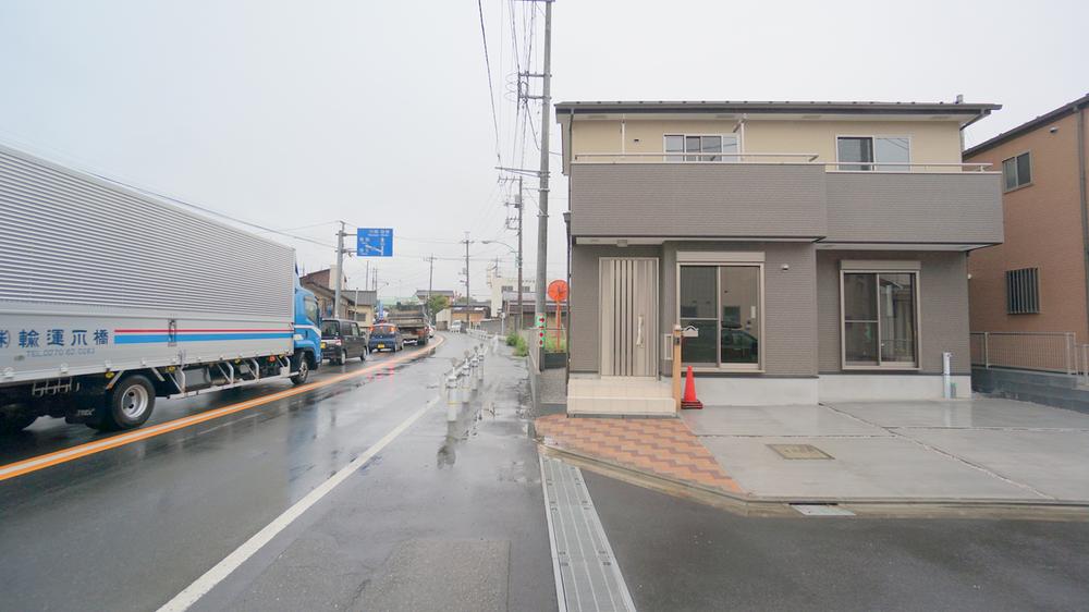 Local photos, including front road. D Building