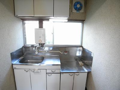 Kitchen. With a small water heater