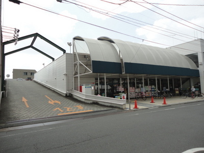 Supermarket. Marufuji to (super) 670m