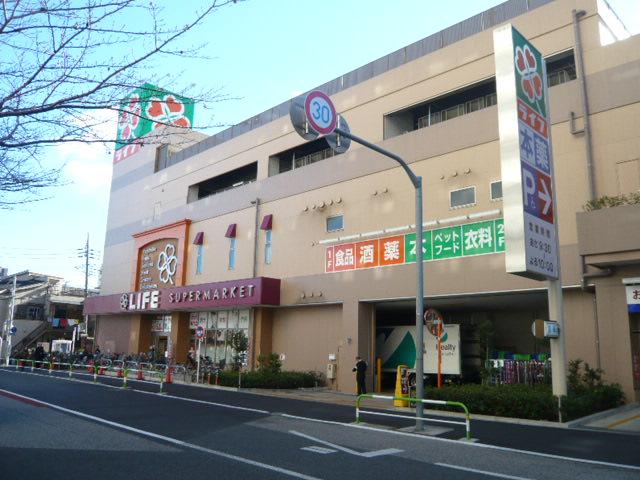 Shopping centre. 320m to super life Minamisenju shop