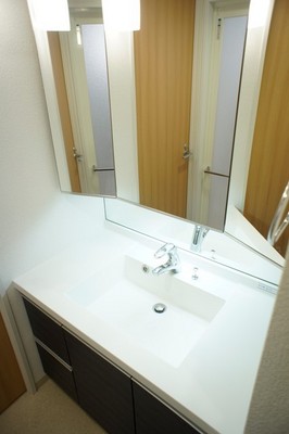 Washroom. Washstand of triple mirror