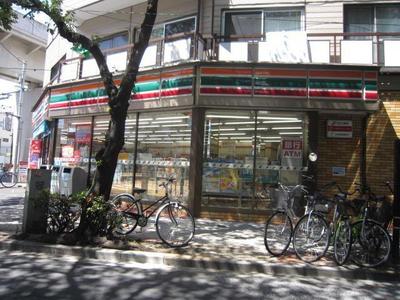 Convenience store. Seven-Eleven Nishinippori 6-chome store up (convenience store) 27m