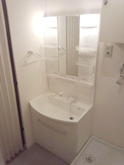 Wash basin, toilet. Bathroom vanity