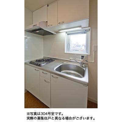 Kitchen. The photograph is a reference photograph of 304, Room.