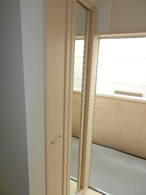 Other room space. Full-length mirror with shoe box