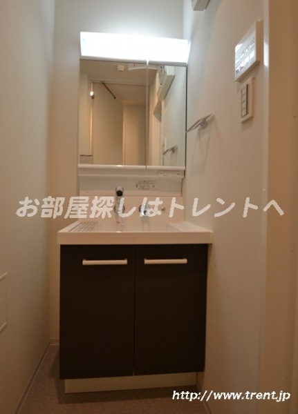 Washroom. We are using a photo of the room in the same building 1K type. Your reference