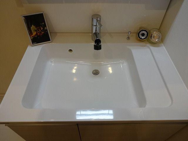 Wash basin, toilet. Bathroom vanity