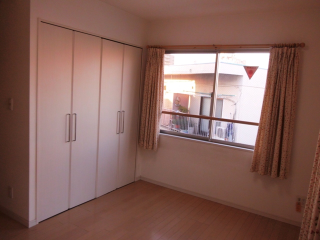 Other room space. It is a bright corner room room